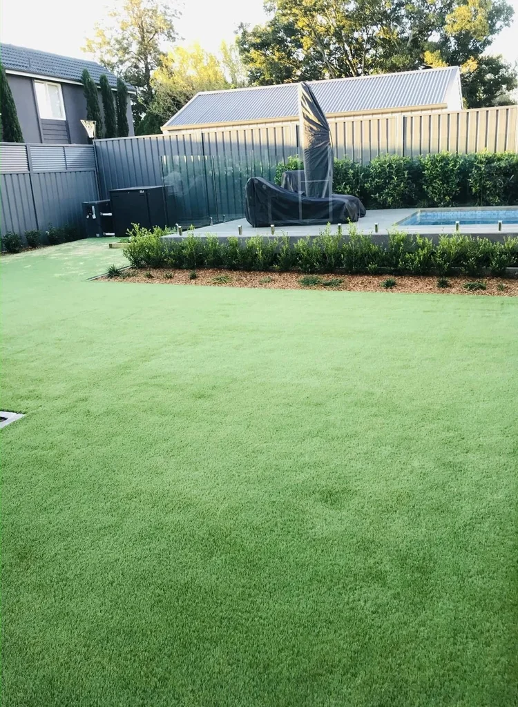 OneGrass synthetic turf installed in a residential backyard