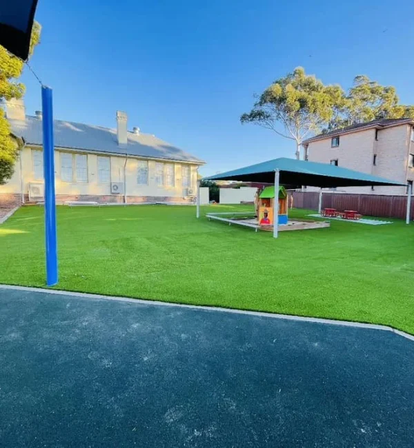 OneGrass artificial turf provides a soft, green play surface for this school playground
