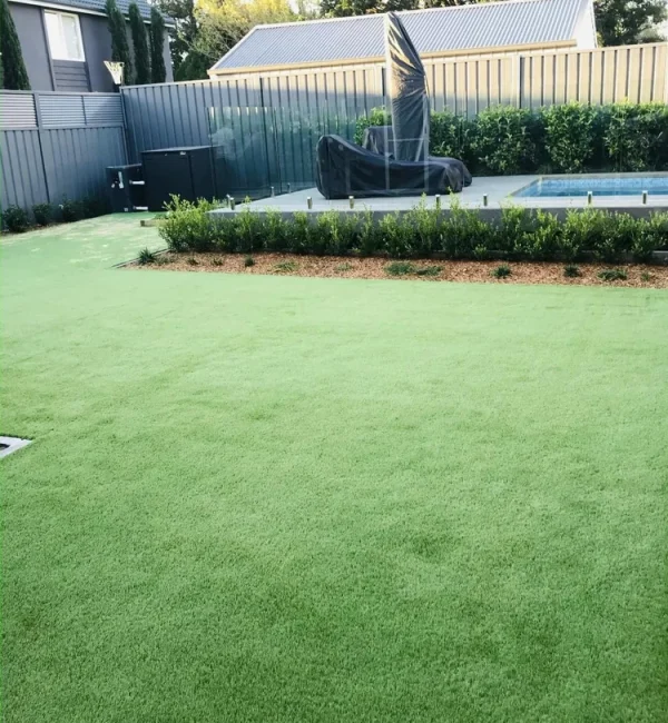 OneGrass synthetic turf installed in a residential backyard