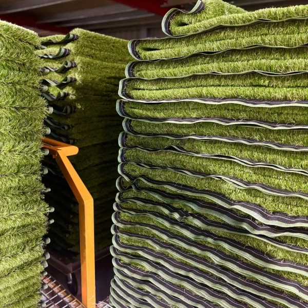 The production trolley is filled with OneGrass synthetic turf