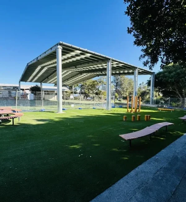 OneGrass premium synthetic turf provides a lush, durable lawn for a school play area
