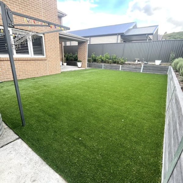 OneGrass synthetic turf provides a lush, low-maintenance lawn in a modern Australian residential backyard